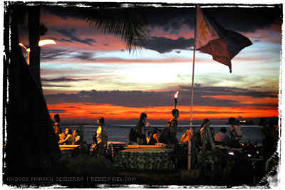 Baywalk. Flag. Sunset.